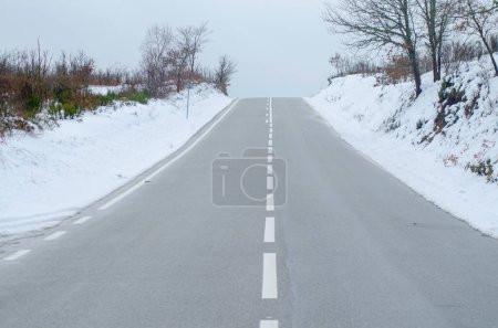 Road in snowy landscape in the National Park of Peneda-Geres. Portugal. Winter time concept