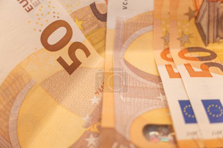 selective focus, detail view of 50-euro banknotes