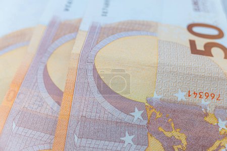 selective focus, detail view of 50 euro bills