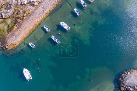 drone aerial top view of a small fishing boat harbor in Portugal