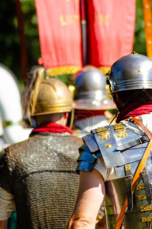 selective focus, roman legionaries in a historical reenactment party