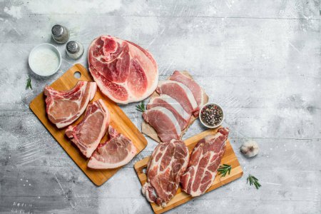 Photo for Variety of raw meat pork. On a rustic background. - Royalty Free Image