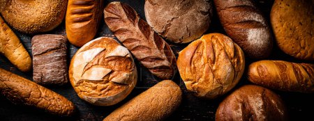 Téléchargez les photos : Différents types de pain. Arrière-plan macro. Photo de haute qualité - en image libre de droit
