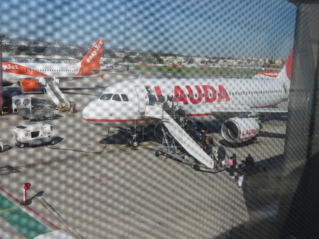 Photo for NAPLES, ITALY - CIRCA APRIL 2023: Lauda Airbus A320 during boarding - Royalty Free Image