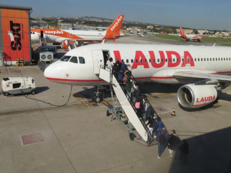 Photo for NAPLES, ITALY - CIRCA APRIL 2023: Lauda Airbus A320 during boarding - Royalty Free Image