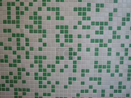 green and white tiled wall useful as a background