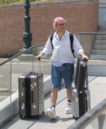 Photo for VENICE, ITALY - JUNE 29, 2022: Dario Mangiaracina, member of Italian pop duo La Rappresentante di Lista, arriving in Venice - Royalty Free Image