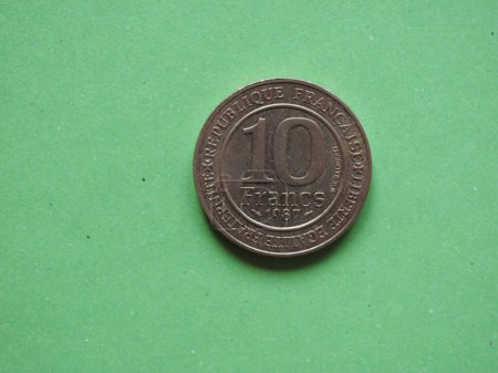 10 francs coin currency of France reading the French Revolution motto Liberte Egalite Fraternite, translated Liberty Equality Brotherhood