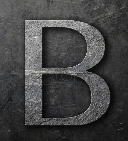 Téléchargez les photos : La lettre "B" sur une feuille d'aluminium rayée et tachée. - en image libre de droit