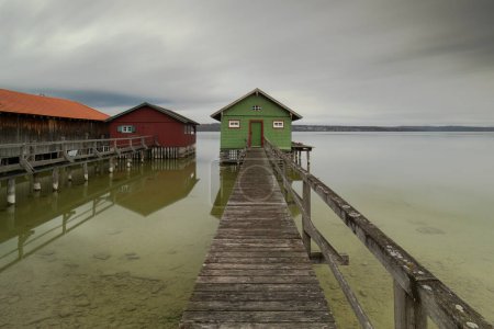 Boathouse and jetty at lake Ammersee in Bavaria, Germany