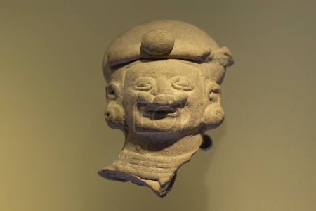 Photo for Colombian ancient anthropomorphic face ceramic at golden museum - Royalty Free Image