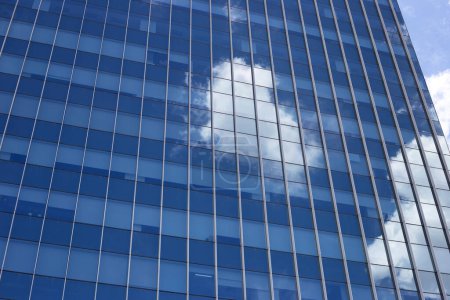 Photo for Reflection of blue sky and cloud on glass building - Royalty Free Image