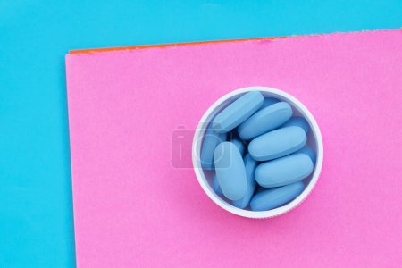 Photo for PrEP ( Pre-Exposure Prophylaxis) blue pills used to prevent HIV - Royalty Free Image