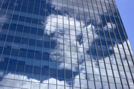 Photo for Reflection of blue sky and cloud on glass building - Royalty Free Image