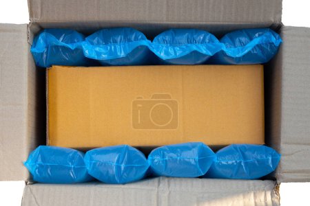 Téléchargez les photos : Coussin d'air bleu sacs en plastique d'emballage - en image libre de droit