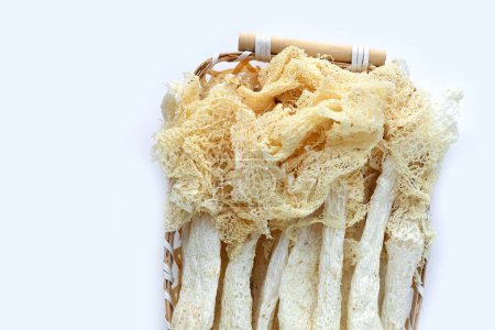 Photo for Dried tropical stinkhorn mushroom in bamboo basket - Royalty Free Image