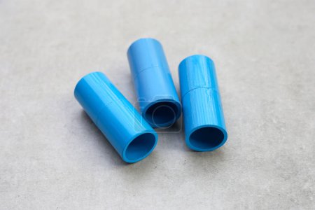 Blue pvc pipe connections for plumbing work.
