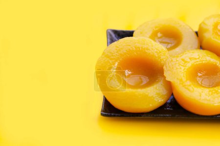 Peach halves in syrup. Fruity desserts