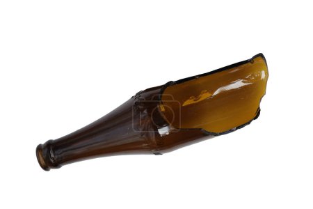 Broken brown bottle on white background