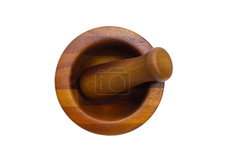  Wooden mortar and pestle on white background