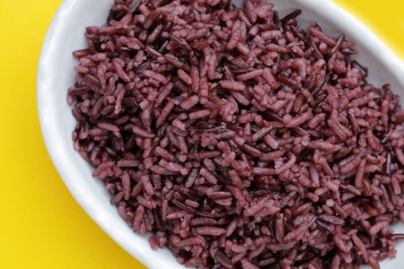 Cooked black berry rice in bowl