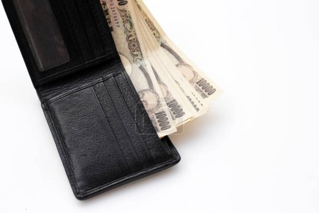 Schwarze Brieftasche mit zehntausenden Yen-Scheinen, japanischen Yen-Scheinen