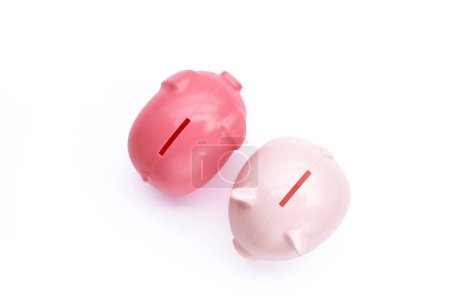 Pink piggy bank on white background.
