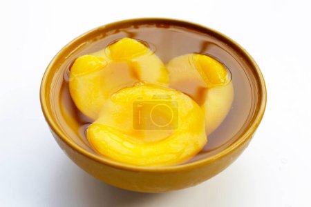 Peach halves in syrup. Fruity desserts