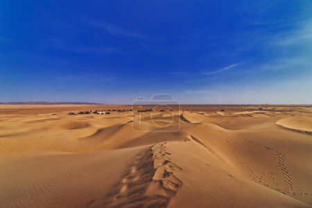 A panoramic sand dune near the desert camp at Mhamid el Ghizlane in Morocco wide shot. High quality photo. Zagora district Mhamid el Ghizlane Morocco 03.06.2024 Here is a desert area in Morocco.