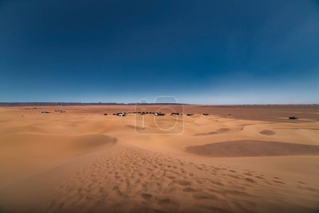 A panoramic sand dune near the desert camp at Mhamid el Ghizlane in Morocco. High quality photo. Zagora district Mhamid el Ghizlane Morocco 03.06.2024 Here is a desert area in Morocco.