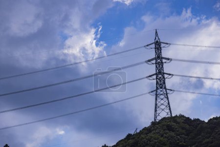 A power line on the mountain at the countryside in Nakanojo Gunma. High quality photo. Agatsuma district Nakanojo Gunma Japan 07.20.2023
