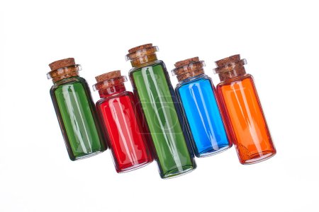 Photo for Many filled glass bottles on isolated background - Royalty Free Image