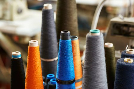 Photo for A few almost used bobbins with knitting threads - Royalty Free Image
