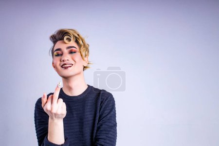 Photo for Body positive i love myself man with gorgeous make up and hairstyle in studio white background. - Royalty Free Image