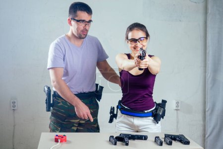 people learning to use the guns. self defense local defense concept.