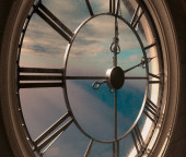 The attic room behind an antique tower clock brightly illuminated by the sun revealing an empty chair looking outwards - 3D rende puzzle #620226748