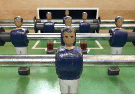 Téléchargez les photos : Une face d'un baby-foot vintage ou d'une table de baby-foot avec des figurines en métal usé stylisées en kit ressemblant à l "équipe nationale de France - rendu 3D - en image libre de droit