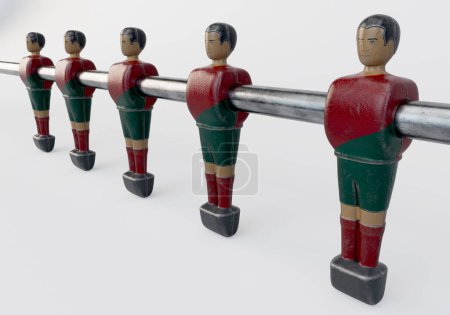 Téléchargez les photos : Une seule ligne de figurines usées d'un baby-foot vintage ou d'une table de baby-foot de style kit ressemblant à l "équipe nationale portugaise - rendu 3D - en image libre de droit