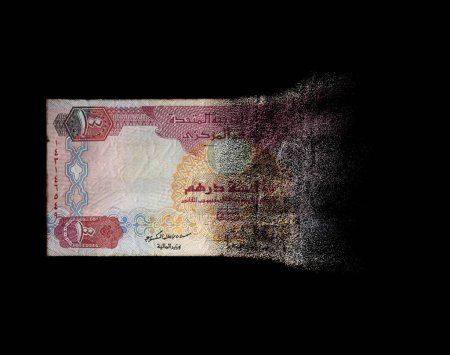 Photo for A concept image showing a half dissolved flat Dirham paper bank note on a dark studio background - 3D render - Royalty Free Image
