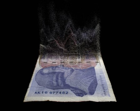 Téléchargez les photos : Une image conceptuelle montrant un billet de banque à moitié dissous en papier plat britannique sur fond de studio sombre - rendu 3D - en image libre de droit