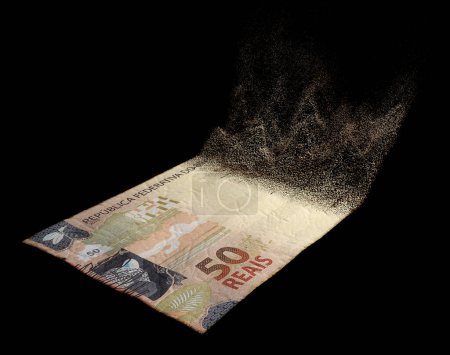 Téléchargez les photos : Une image conceptuelle montrant un billet de banque réel brésilien en papier plat à moitié dissous sur fond de studio sombre - rendu 3D - en image libre de droit
