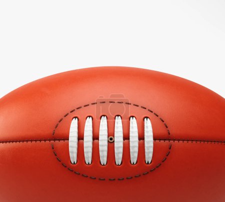 Téléchargez les photos : A generic unbranded aussie rules football ball on an isolated studio background - 3D render - en image libre de droit