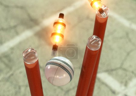 Téléchargez les photos : Une boule de cricket blanche frappant des guichets de cricket électroniques orange avec des cloisons délogantes et des lumières LED sur un fond de ciel nocturne - rendu 3D - en image libre de droit
