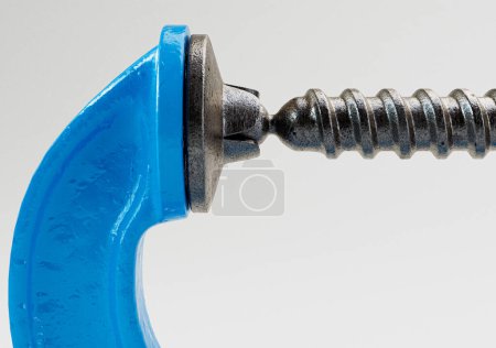 Photo for A blue vintage styled G-clamp tool on an isolated white studio background - 3D render - Royalty Free Image