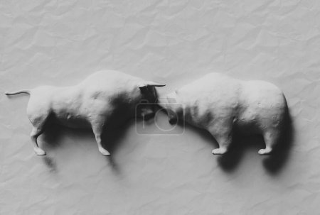 Foto de Dos estatuillas de arcilla blanca que representan un toro estilizado y llevan una luz dramática que representa las tendencias del mercado financiero sobre un fondo de estudio de papel blanco - 3D render - Imagen libre de derechos