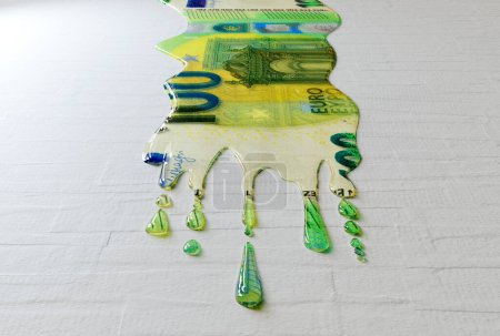 A concept image showing a regular European Euro banknote that is melted and liquified dripping on an white surface background - 3D render