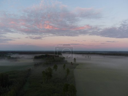 Photo for Majestic Morning: Aerial View of Enchanting Misty Landscape in Northern Europe - Royalty Free Image
