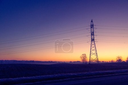 A beautiful morning scenery of an industrial construction against the sky. Early winter scenery of Northern Europe.