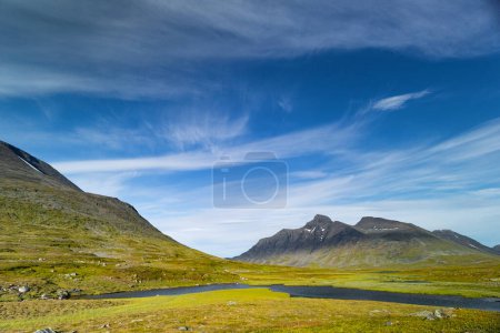 A beautiful summer landscape of Sarek National Park with river. Wild scenery of Northern Europe.