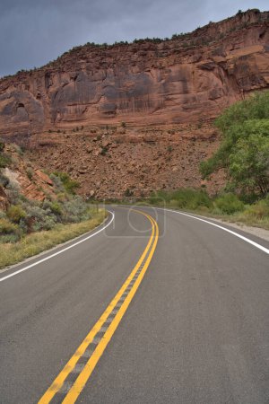 Photo for Twisting asphalt highway thru a canyon in rural Arizona - Royalty Free Image